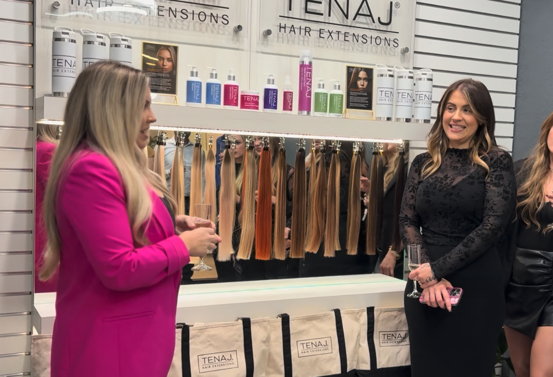 Three Salon Jaylee gift cards with festive designs are displayed on a white surface with pine branches, gift boxes, and gold star confetti. - Salon Jaylee | The Villages, FL