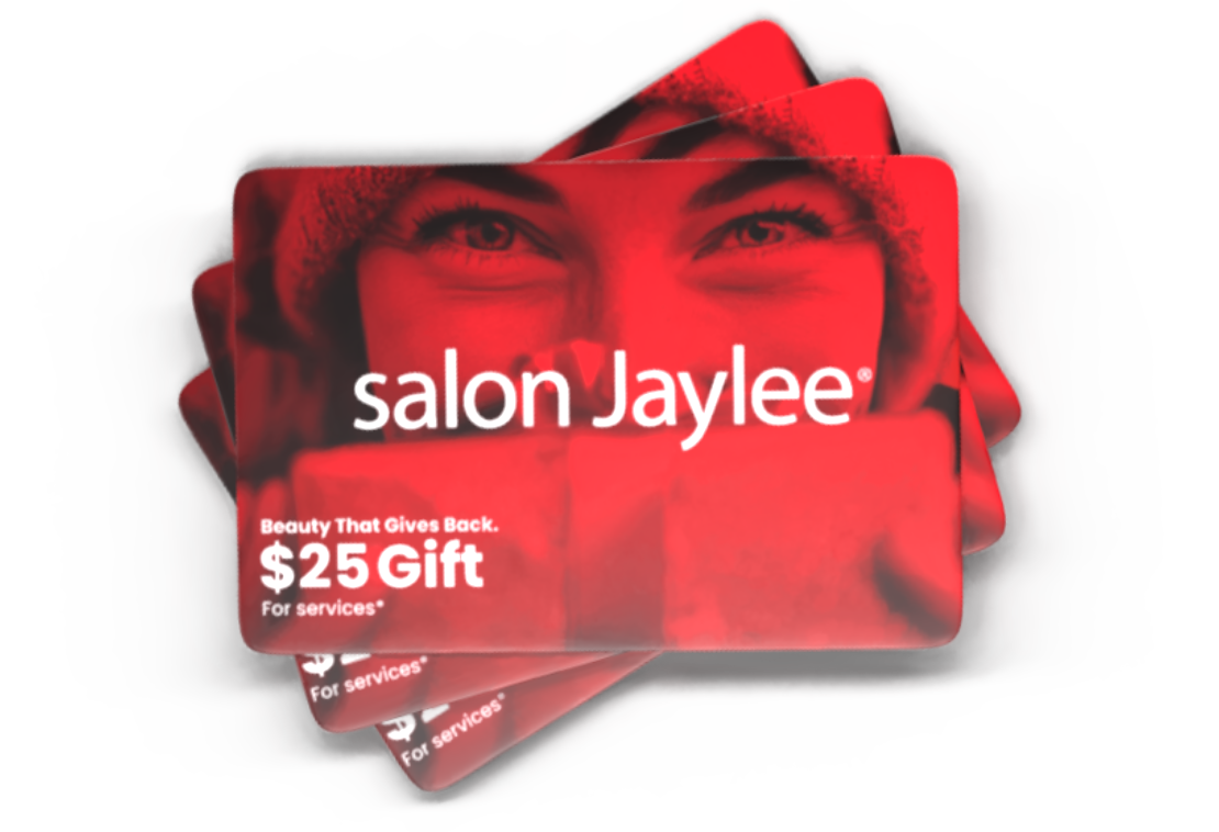 A stack of red Salon Jaylee $25 gift cards, partially overlapping, with a close-up face image and white text on each card. - Salon Jaylee | The Villages, FL