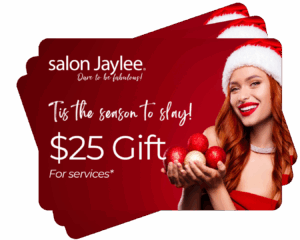 A $25 Salon Jaylee gift card featuring a woman in a Santa hat holding red and gold ornaments, with text "’Tis the season to slay!" on a red background. - Salon Jaylee | The Villages, FL